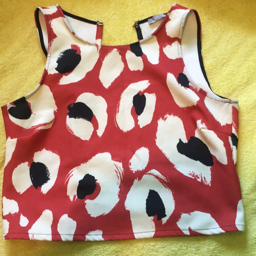 A no sleeve, open back shirt